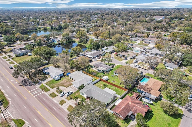 aerial view featuring a water view and a residential view