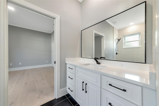 600 Eagle Watch Ln, Osprey, FL 34229 - full bath with vanity, a shower, ornamental molding, and wood finished floors