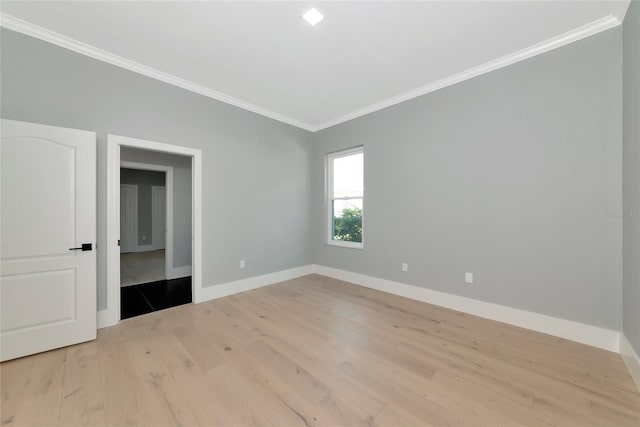 600 Eagle Watch Ln, Osprey, FL 34229 - unfurnished bedroom with crown molding and wood finished floors