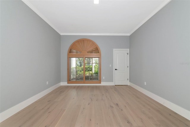 600 Eagle Watch Ln, Osprey, FL 34229 - spare room featuring light wood finished floors and ornamental molding