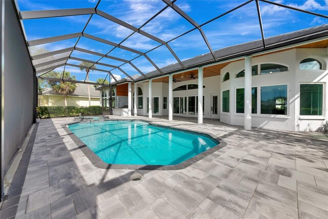 600 Eagle Watch Ln, Osprey, FL 34229 - view of swimming pool with a patio, a ceiling fan, a pool with connected hot tub, and glass enclosure