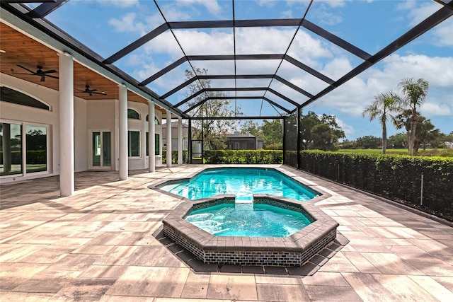 600 Eagle Watch Ln, Osprey, FL 34229 - view of pool with a pool with connected hot tub, ceiling fan, a patio area, and a lanai