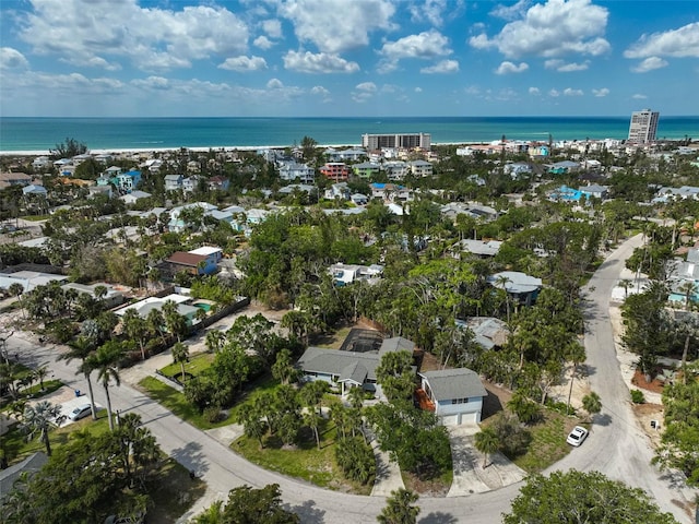 aerial view of property's location featuring a large body of water