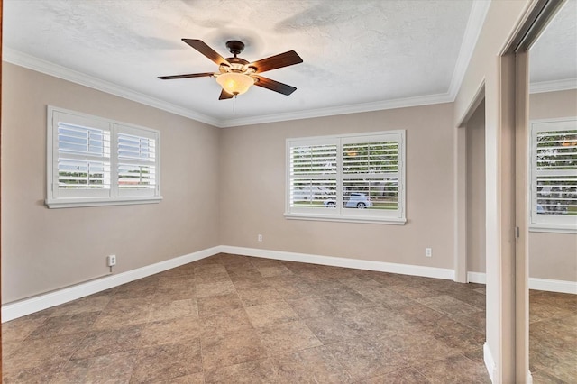 unfurnished bedroom with crown molding, baseboards, multiple windows, and a textured ceiling