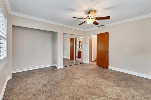 unfurnished bedroom featuring visible vents, baseboards, crown molding, and a ceiling fan