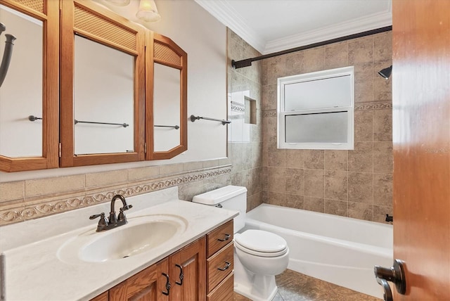 full bathroom with tile walls, toilet, tub / shower combination, crown molding, and vanity
