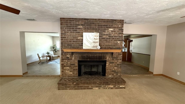 3072 Meyer Dr, Sarasota, FL 34239 - unfurnished living room featuring a textured ceiling, baseboards, a brick fireplace, and carpet