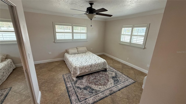 3072 Meyer Dr, Sarasota, FL 34239 - tiled bedroom with multiple windows, crown molding, ceiling fan, a textured ceiling, and baseboards