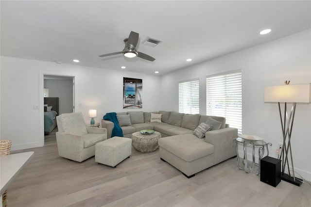 8152 Seashell St, Englewood, FL 34224 - living room featuring light wood-style floors, ceiling fan, recessed lighting, and baseboards