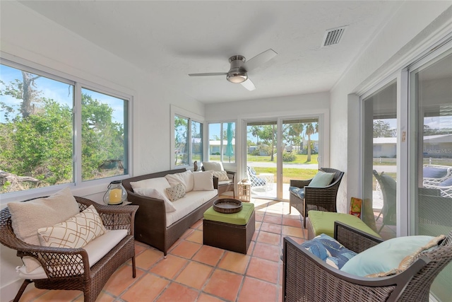 8152 Seashell St, Englewood, FL 34224 - sunroom / solarium with plenty of natural light, an outdoor hangout area, and a ceiling fan
