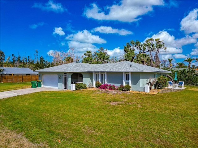 8152 Seashell St, Englewood, FL 34224 - single story home with driveway, an attached garage, and stucco siding