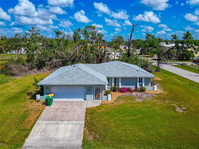 8152 Seashell St, Englewood, FL 34224 - single story home with a garage, stucco siding, driveway, a front yard, and a shingled roof