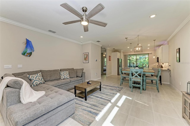 224 Soliera St, Nokomis, FL 34275 - living area with crown molding, light tile patterned floors, visible vents, and recessed lighting