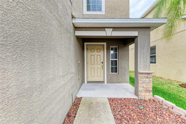 1912 Hawks View Dr, Ruskin, FL 33570 - entrance to property featuring stucco siding