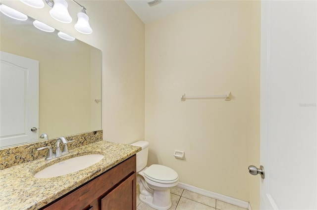 1912 Hawks View Dr, Ruskin, FL 33570 - bathroom featuring toilet, tile patterned floors, vanity, and baseboards