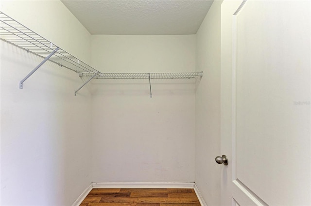 1912 Hawks View Dr, Ruskin, FL 33570 - walk in closet featuring dark wood finished floors