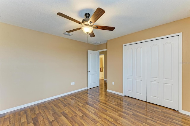 1912 Hawks View Dr, Ruskin, FL 33570 - unfurnished bedroom featuring visible vents, baseboards, and wood finished floors