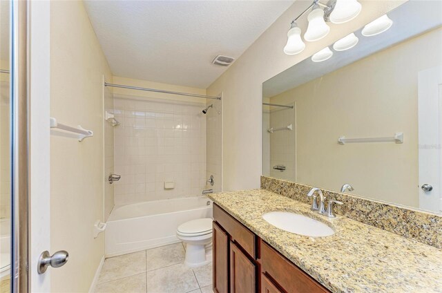 1912 Hawks View Dr, Ruskin, FL 33570 - full bath with tub / shower combination, vanity, tile patterned flooring, visible vents, and toilet
