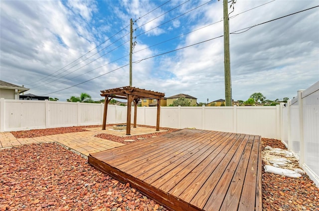 1912 Hawks View Dr, Ruskin, FL 33570 - wooden terrace with a fenced backyard, a patio, and a pergola