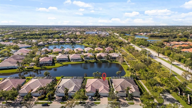 aerial view featuring a water view and a residential view