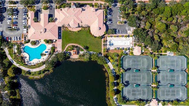 birds eye view of property featuring a water view