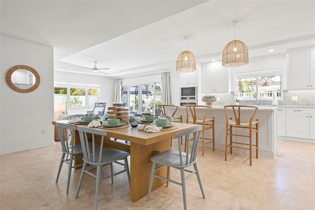 dining room featuring recessed lighting