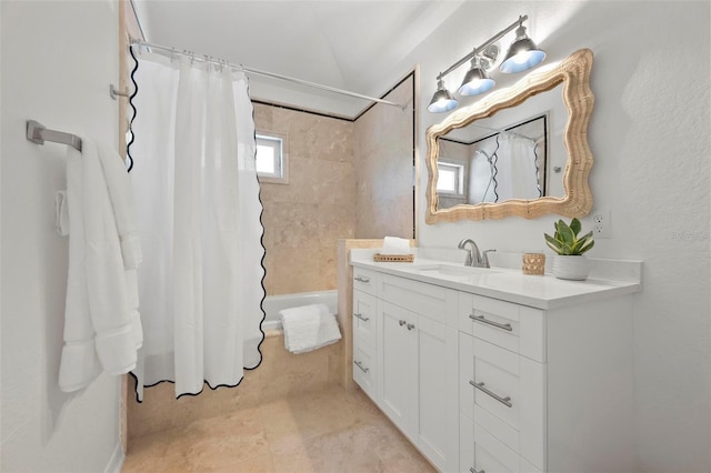 full bath with shower / tub combo with curtain and vanity