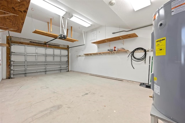 garage with electric water heater and a garage door opener