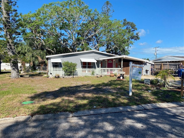 6324 Case Ave, Bradenton, FL 34207 - view of front facade featuring a carport