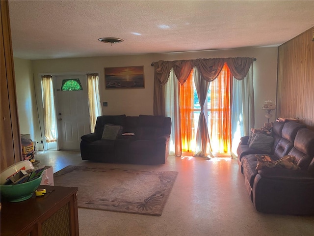 6324 Case Ave, Bradenton, FL 34207 - living room featuring healthy amount of natural light and a textured ceiling