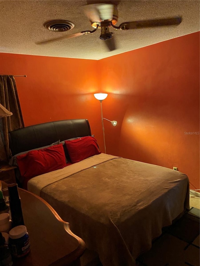 6324 Case Ave, Bradenton, FL 34207 - bedroom with a textured ceiling and ceiling fan