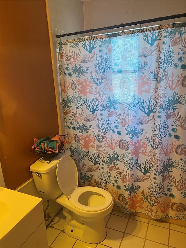 6324 Case Ave, Bradenton, FL 34207 - full bathroom featuring tile patterned floors, toilet, vanity, and a shower with curtain