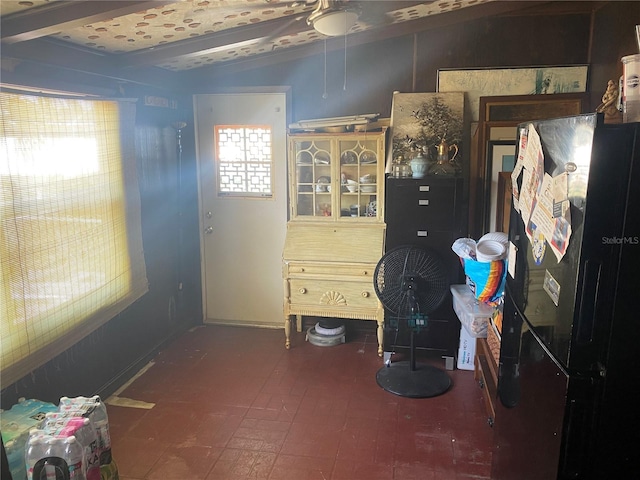 6324 Case Ave, Bradenton, FL 34207 - bedroom with freestanding refrigerator, multiple windows, and lofted ceiling