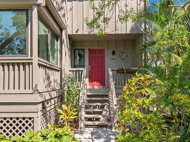 1493 Landings Lake Dr Unit 32, Sarasota, FL 34231 - property entrance featuring board and batten siding