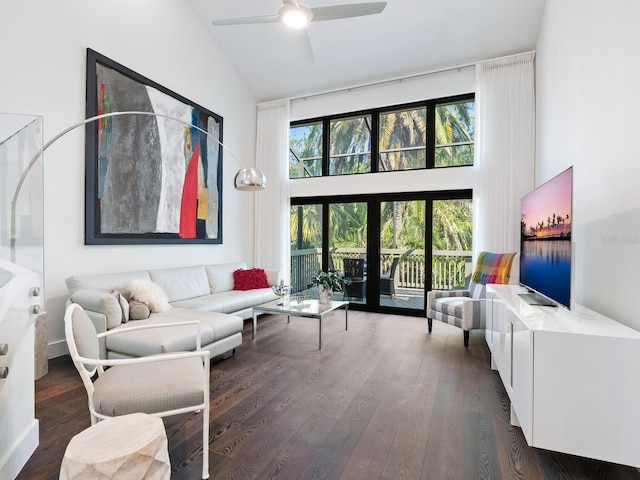 1493 Landings Lake Dr Unit 32, Sarasota, FL 34231 - living area featuring wood finished floors, a healthy amount of sunlight, and high vaulted ceiling