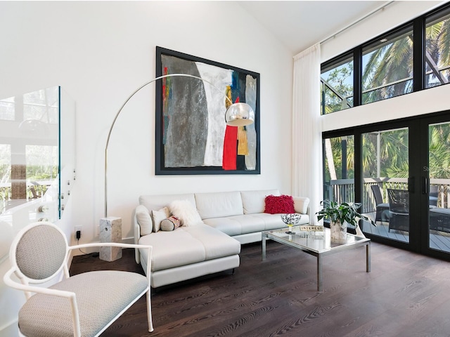 1493 Landings Lake Dr Unit 32, Sarasota, FL 34231 - living room featuring lofted ceiling, wood finished floors, and french doors