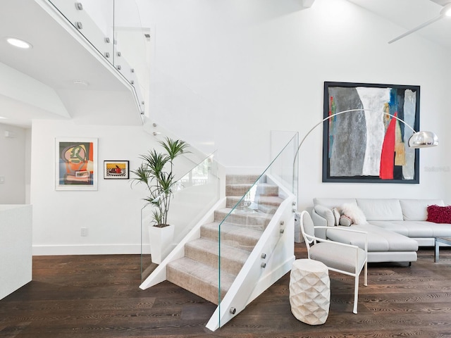 1493 Landings Lake Dr Unit 32, Sarasota, FL 34231 - staircase with recessed lighting, wood finished floors, and baseboards