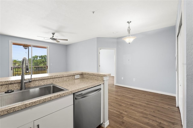 kitchen with dark wood-style flooring, a ceiling fan, white cabinets, dishwasher, and a sink