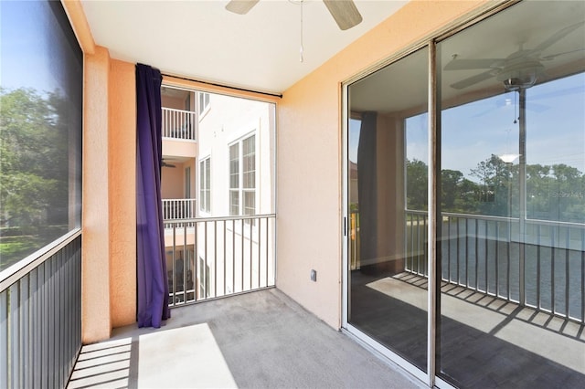 balcony featuring a ceiling fan