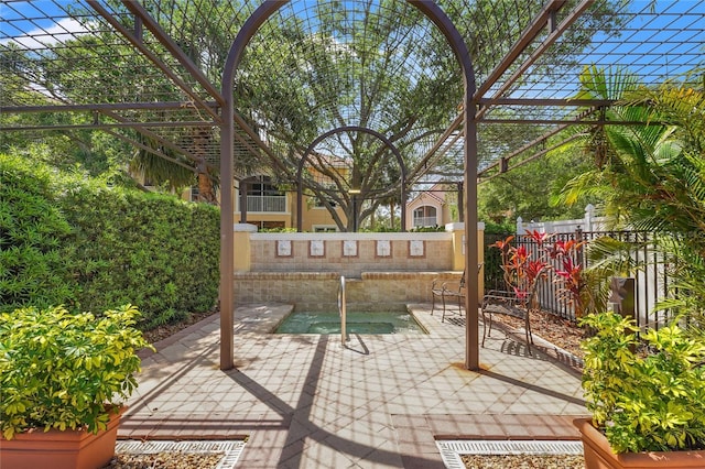 view of patio with a fenced backyard and a pergola