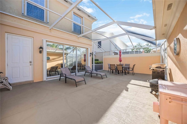 1586 Dorgali Dr, Sarasota, FL 34238 - view of patio / terrace with outdoor dining area and a lanai