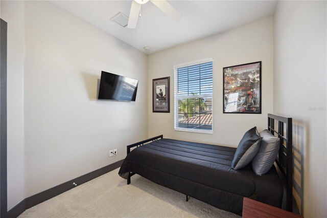 1586 Dorgali Dr, Sarasota, FL 34238 - bedroom with carpet floors, baseboards, and ceiling fan