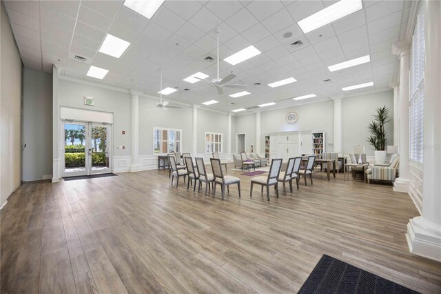 1586 Dorgali Dr, Sarasota, FL 34238 - misc room featuring a high ceiling, french doors, ornate columns, a drop ceiling, and a ceiling fan
