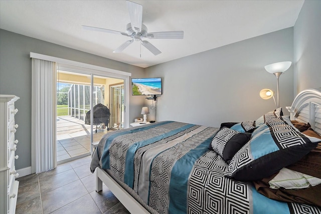 tiled bedroom with access to outside, ceiling fan, and baseboards