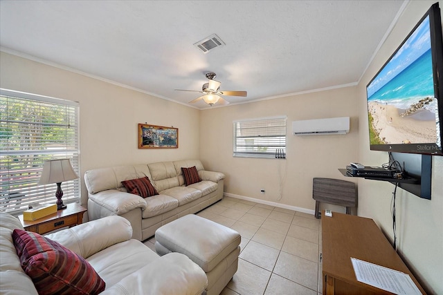 living area featuring a wall mounted AC, a ceiling fan, ornamental molding, and light tile patterned flooring