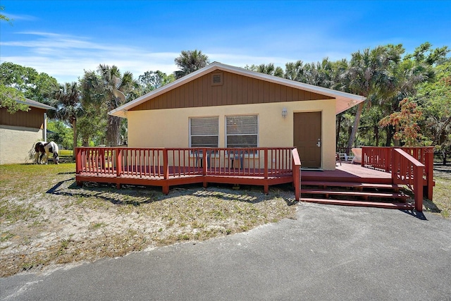 view of front of home with a deck