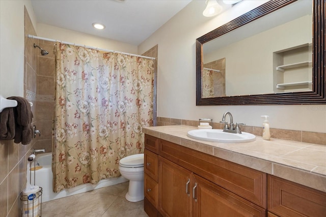 bathroom with shower / tub combo, tile patterned floors, vanity, and toilet
