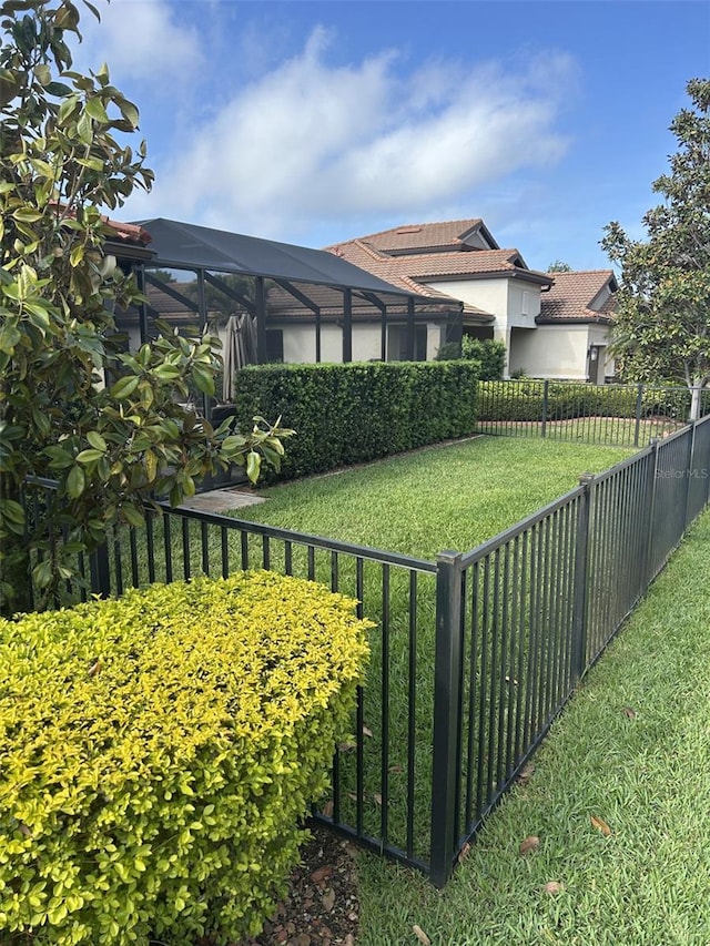4622 Grand Lakeside Dr, Palm Harbor, FL 34684 - view of yard with glass enclosure