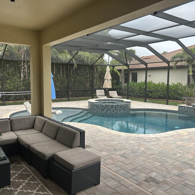 4622 Grand Lakeside Dr, Palm Harbor, FL 34684 - view of pool with an outdoor hangout area, a patio, a pool with connected hot tub, and a lanai