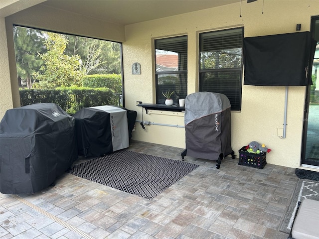 4622 Grand Lakeside Dr, Palm Harbor, FL 34684 - view of patio featuring grilling area and ceiling fan